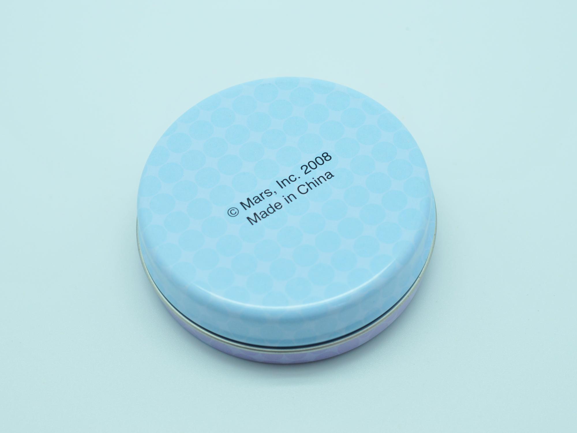 round tin box (3).jpg