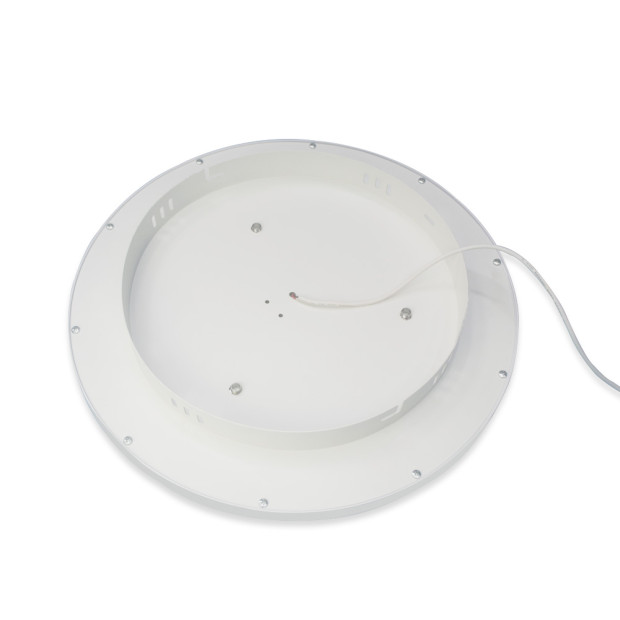 Lumin round LED panel light surface mounted on white ceiling