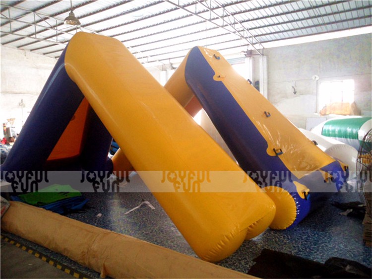 Inflatable floating tube slides