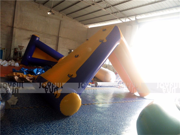 Inflatable floating tube slides