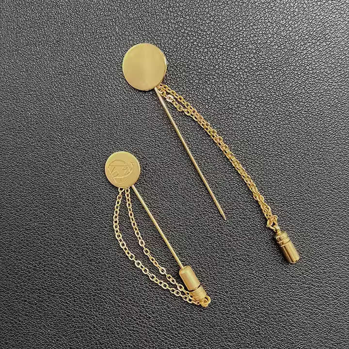 gold brooch pin with chain tassue