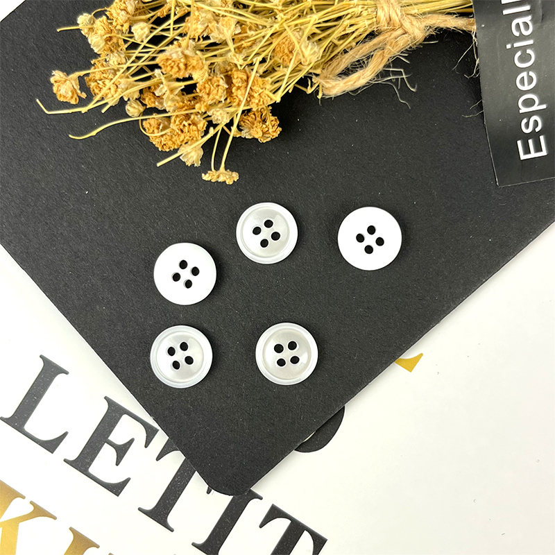 white plastic buttons