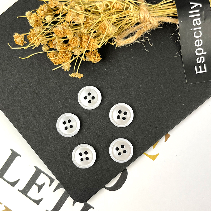 white plastic buttons