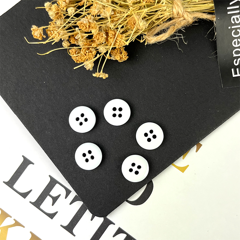 white plastic buttons