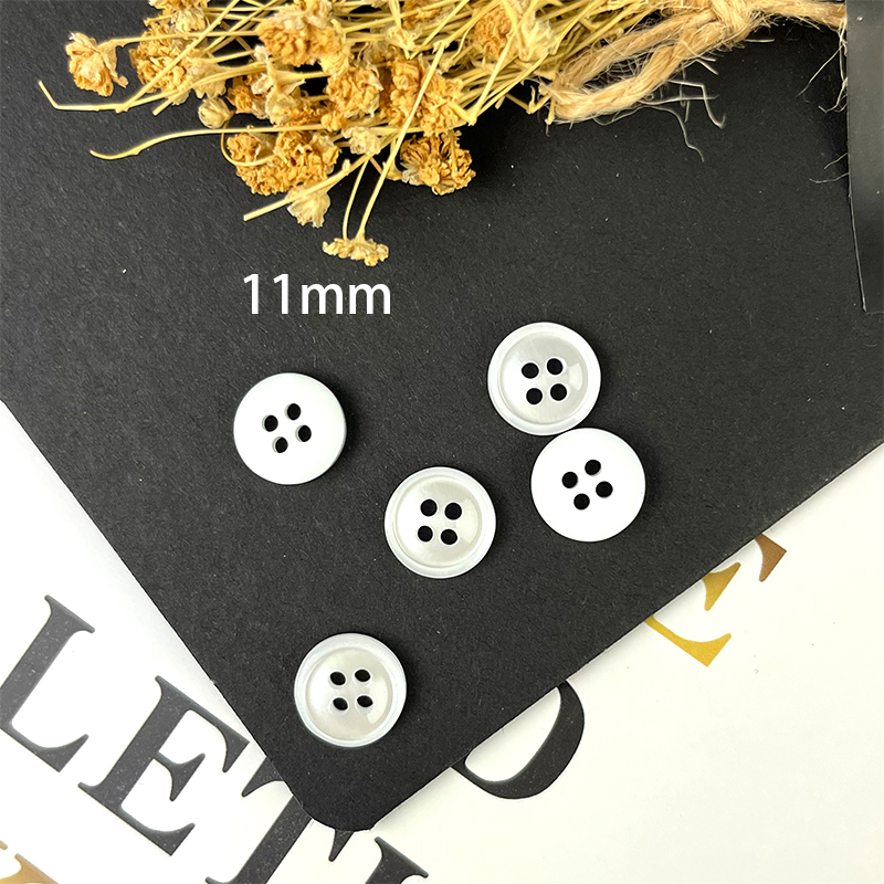 white plastic buttons