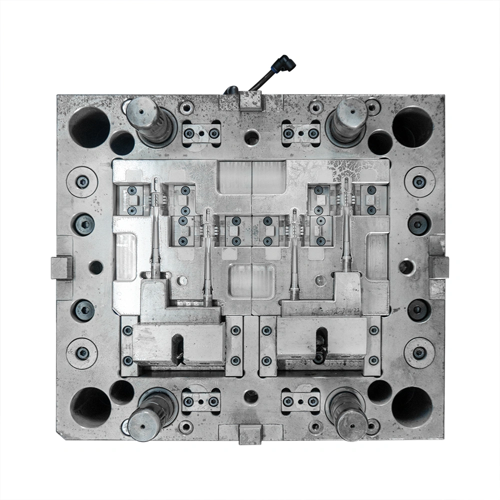 2K molding machines use dual-injection systems to create multi-material parts (e.g., seals, grips) in one cycle. Optimizes efficiency, reduces assembly, and meets automotive/electronics durability/aesthetic requirements.