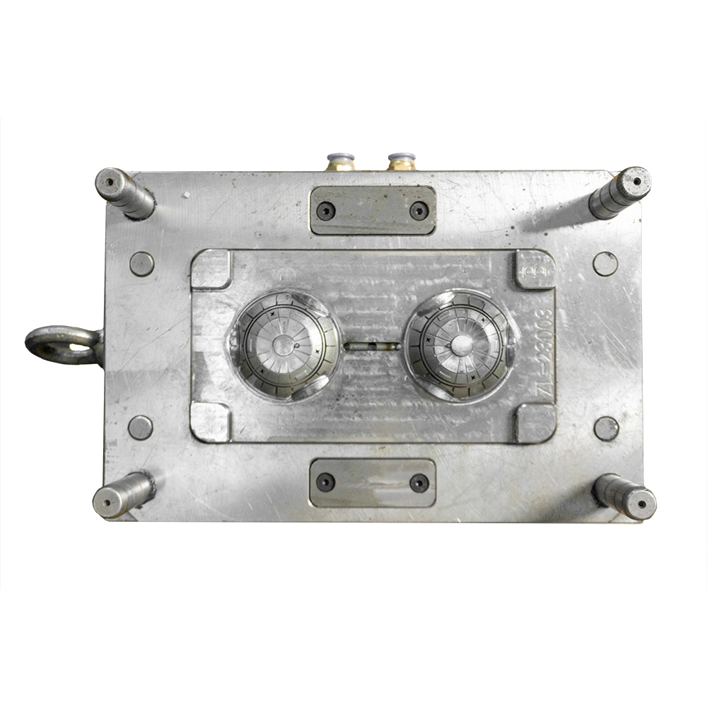 IMD Process: A pre-printed film is placed into the mold. Molten plastic is injected behind it, bonding the decoration permanently to the part during forming. This creates seamless, scratch-resistant graphics in a single step.