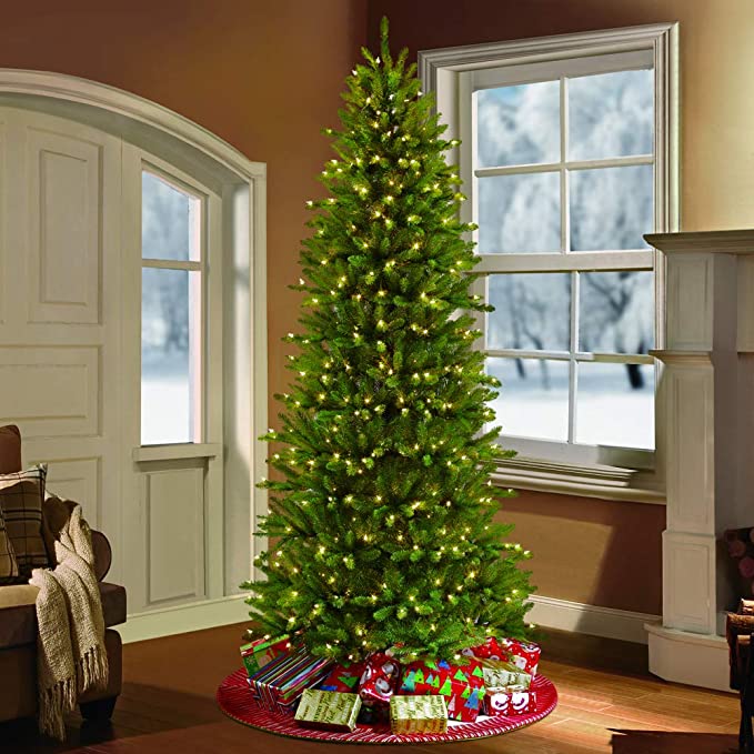 Lush PVC Branches with Warm White LED Lights. Easy assembly, sturdy metal stand, needle-free design. Ideal indoor holiday decor for cozy Christmas ambiance. Shop durable, full-bodied 210cm Christmas trees for festive home styling.